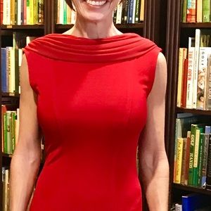 Red backless evening down with rhinestone brooches